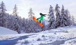 Man jumping while snowboarding at Powder Ridge