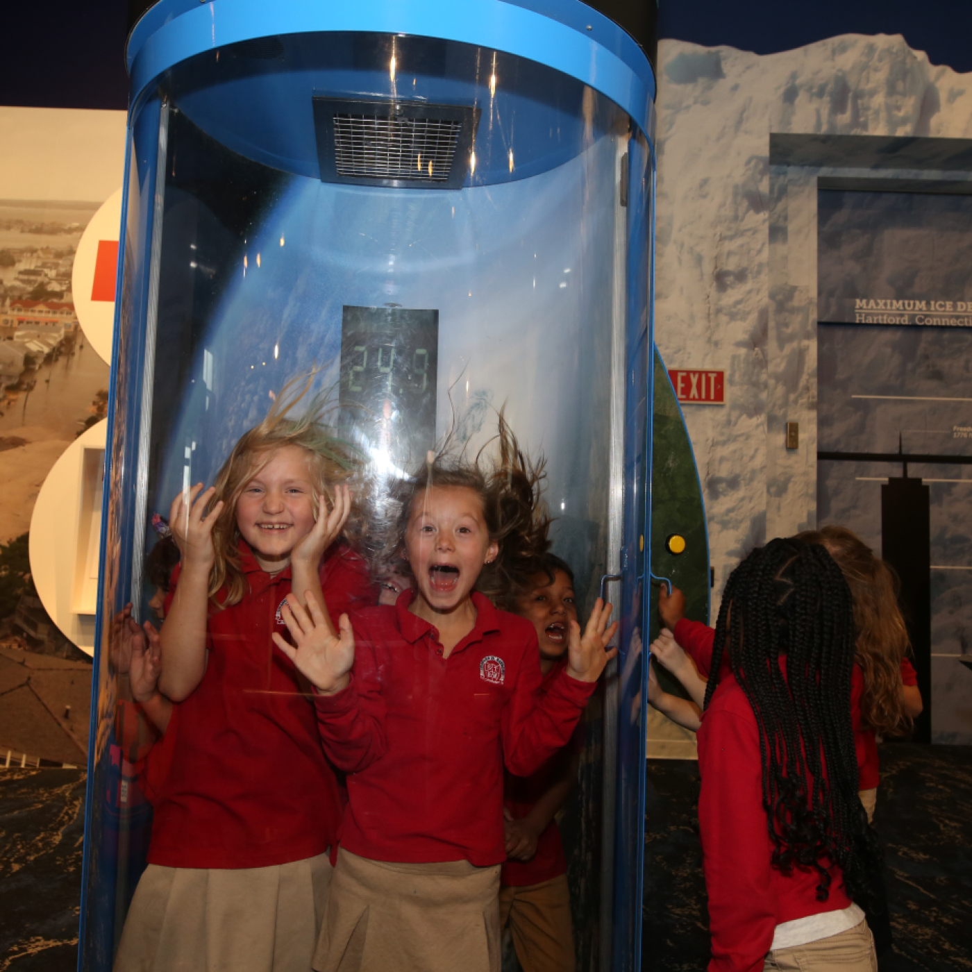 A group of kids enjoying themselves in our Hurricane Simulator on Level 6. 