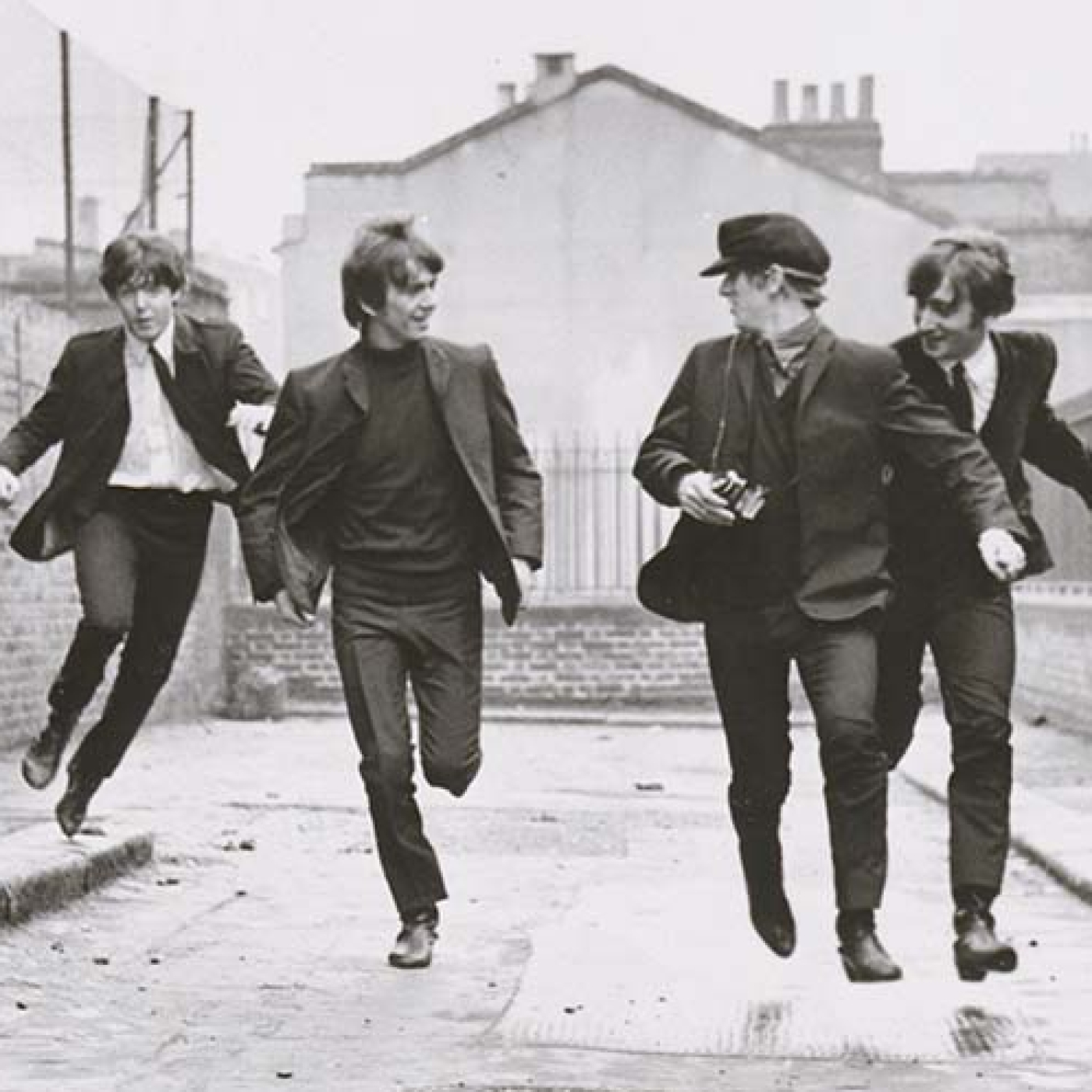 Screen cap of the Beatles in A Hard Day's Night