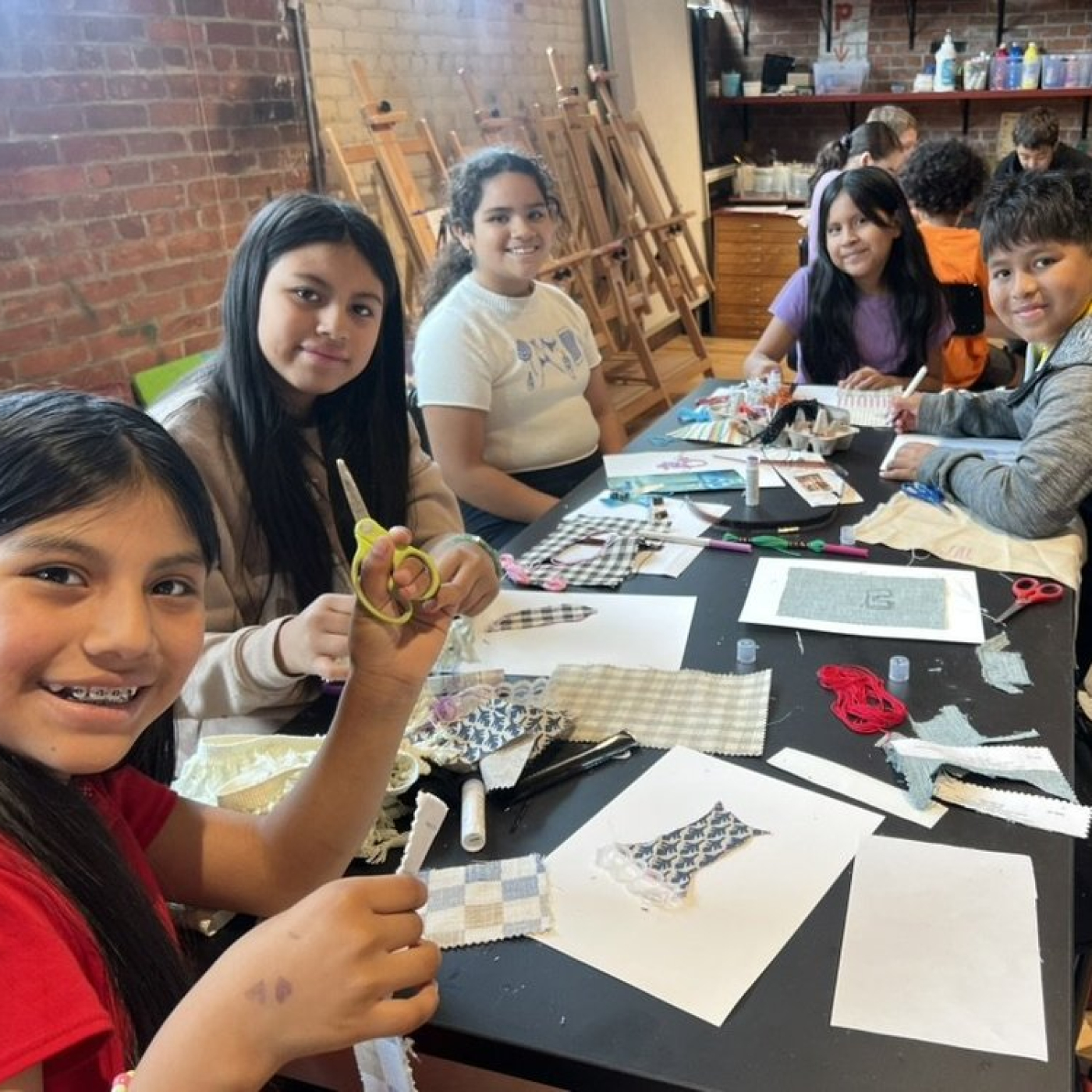 Kids doing arts and crafts.