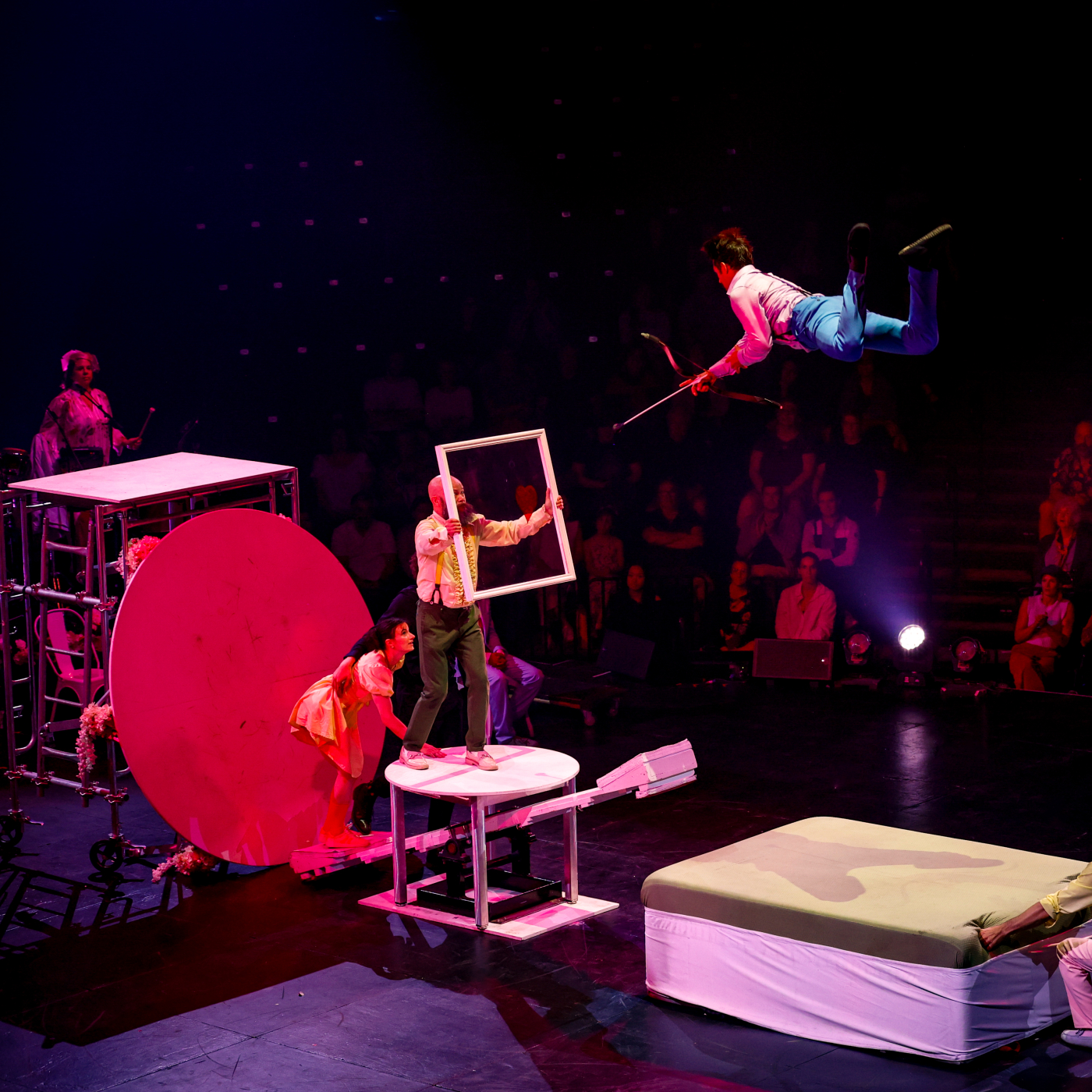 Alfonse team performs an archery acrobatic act