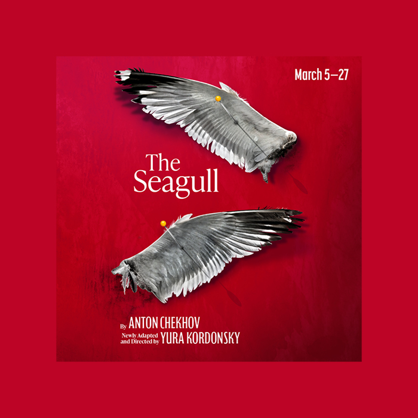 The Seagull red background, two severed gray-and-white seagull wings cross the image, pinned with a yellow-headed pin. 