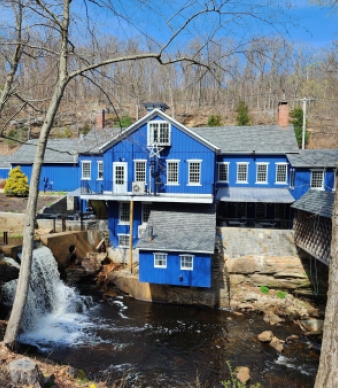 Brushmill by the Waterfall