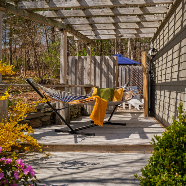 Private pet-friendly guest cottage at Abbey's Lantern Hill Inn. Relax in a private hammock at the Cottage!