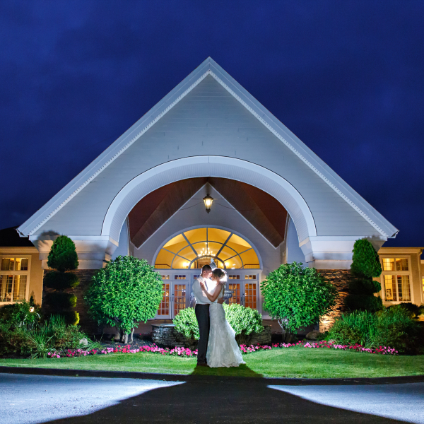 Bride and Groom outside The Riverhouse