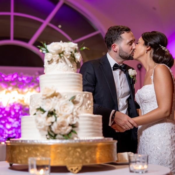 Happy couple celebrating at their dream wedding venue.
