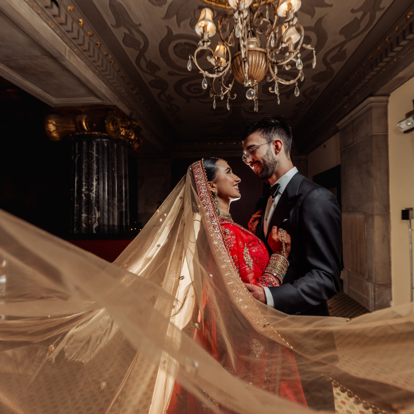 Couple shares a moment during their wedding at The Society Room of Hartford