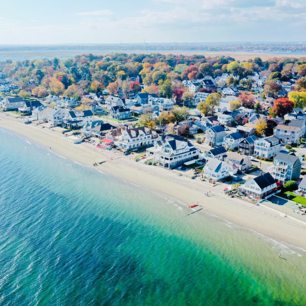 Aerial view of Wildemere & Walnut Beach, with turquoise Long Island Sound water during a phytoplankton event w/ WBLH visible