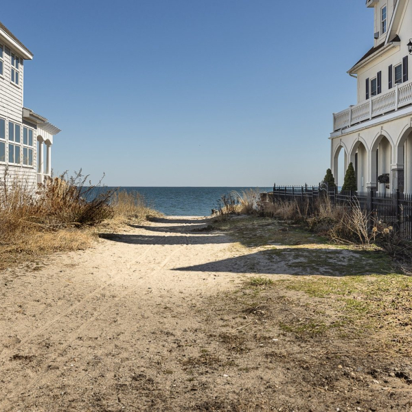Sandy access path to quiet residential Wildemere Beach, about a 90-second walk from the house.