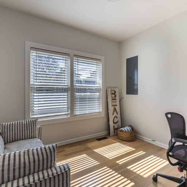 Private office with high-speed Wi-Fi, Eero mesh internet, desk workspace, and full-size sofa bed.