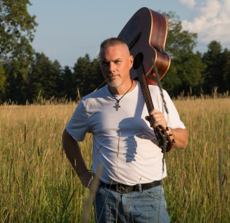 Jeff Conlon with guitar