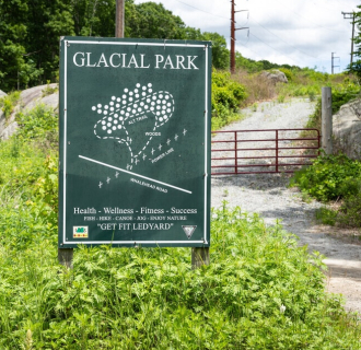 This photo depicts the entrance sign to Glacial Park in Ledyard