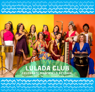 Eleven women in colorful outfits pose with their instruments