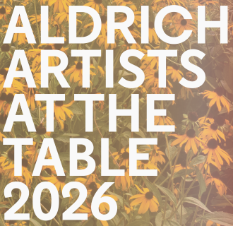 Aldrich Artists at the Table against a background of black eyed susan flowers