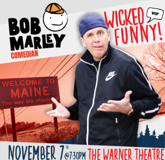 Comedian Bob Marley standing in front of a "welcome to Maine"sign.