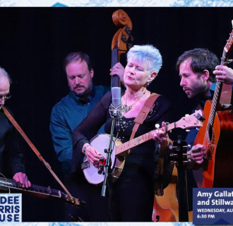 Amy Gallatin & Stillwaters performing their music. 