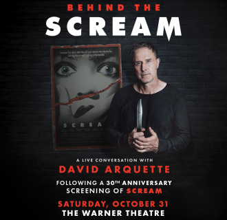 David Arquette standing in front of the Scream artwork holding a knife.