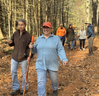 People hiking in woods