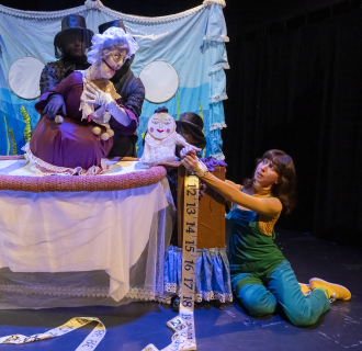Actors performing on stage in the production "Bequeathed"