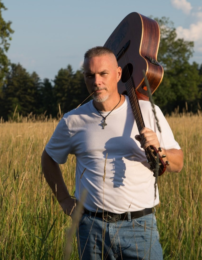 Jeff Conlon with guitar