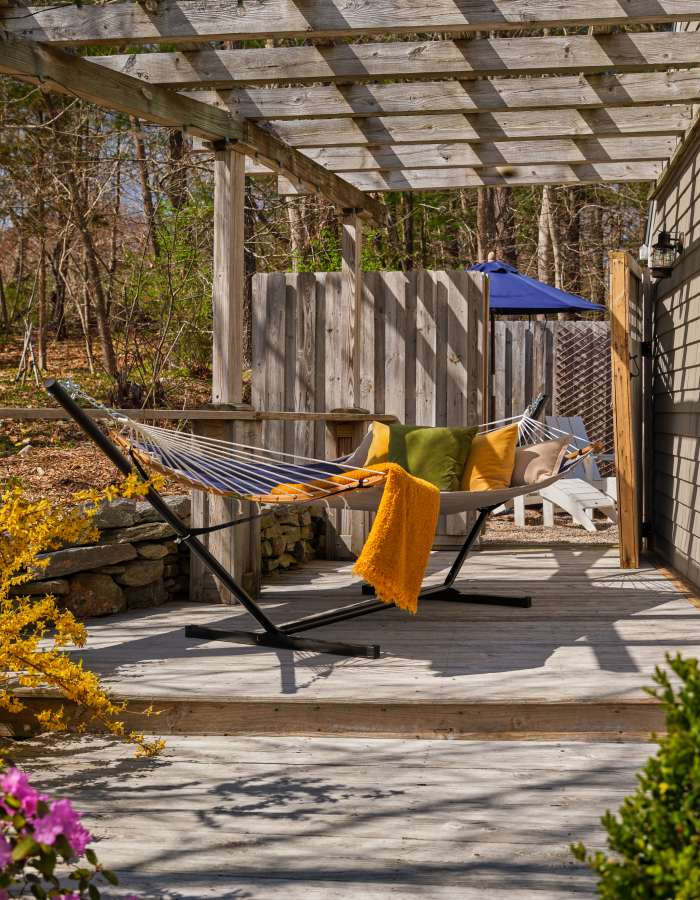 Private pet-friendly guest cottage at Abbey's Lantern Hill Inn. Relax in a private hammock at the Cottage!