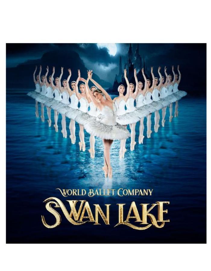 The ballerinas are are lined up diagonally, wearing all white with their arms up