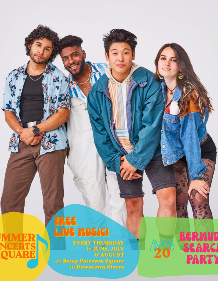 Four young people in colorful clothing stand together, smiling for the camera