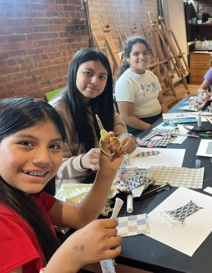 Kids doing arts and crafts.