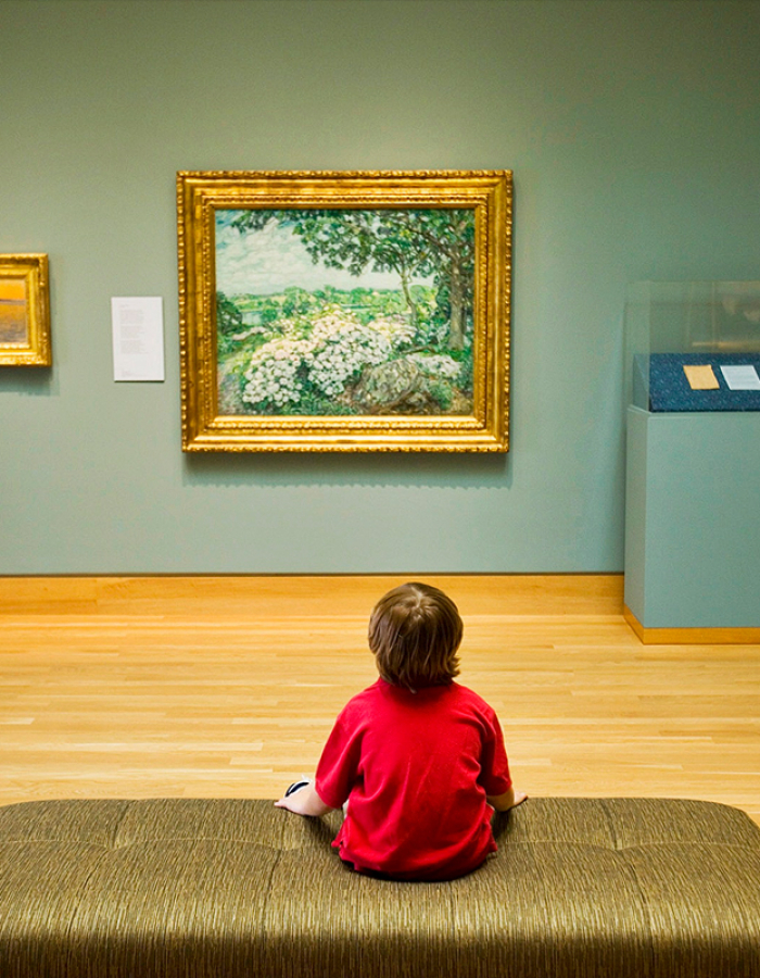 Child looking at art at Florence Griswold Museum, Old Lyme