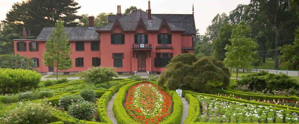 Roseland Cottage Victorian home with manicured flower garden in Woodstock