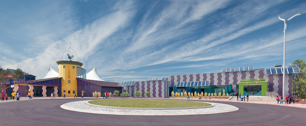 Children and adults outside colorful modern museum with solar panels and wind turbine