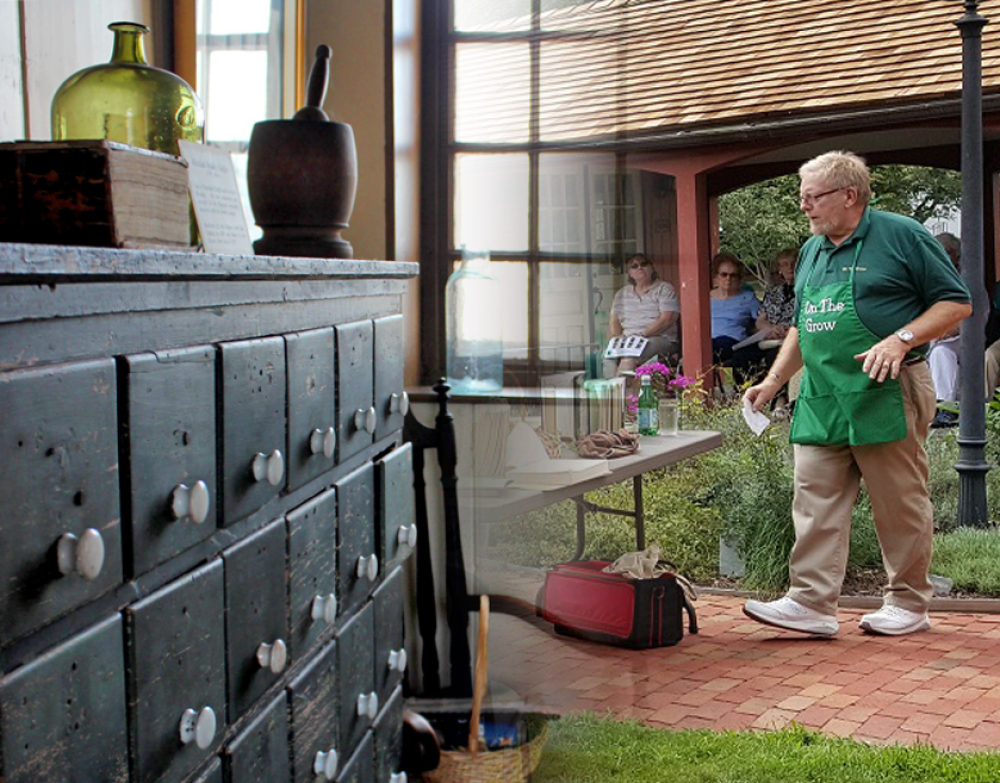 Person in green apron giving apothecary demonstration outdoors