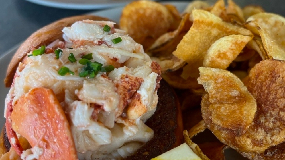 A lobster roll and potato chips at Match Burger Lobster, Westport