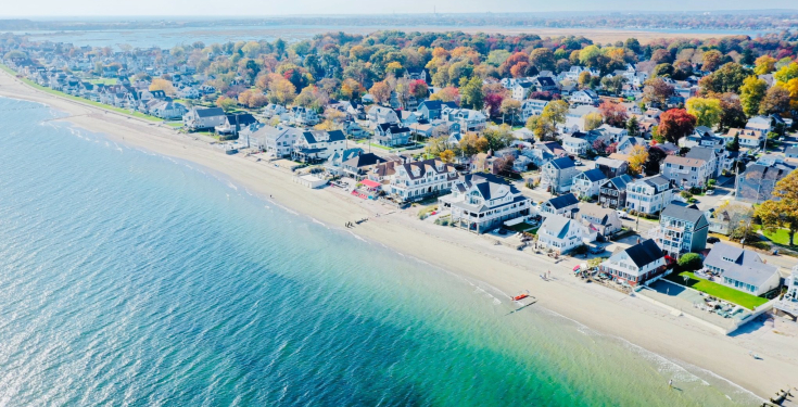 Aerial view of Wildemere & Walnut Beach, with turquoise Long Island Sound water during a phytoplankton event w/ WBLH visible